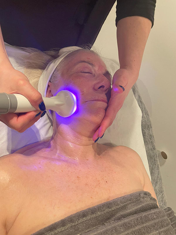 Someone having radio frequency skincare treatment